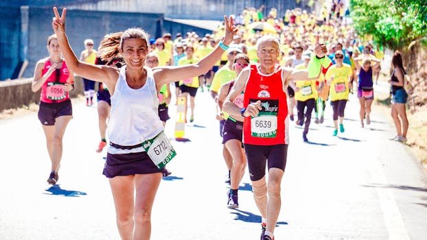 pexels-photo-2402777-2402777 Female and Male Runners on a Marathon